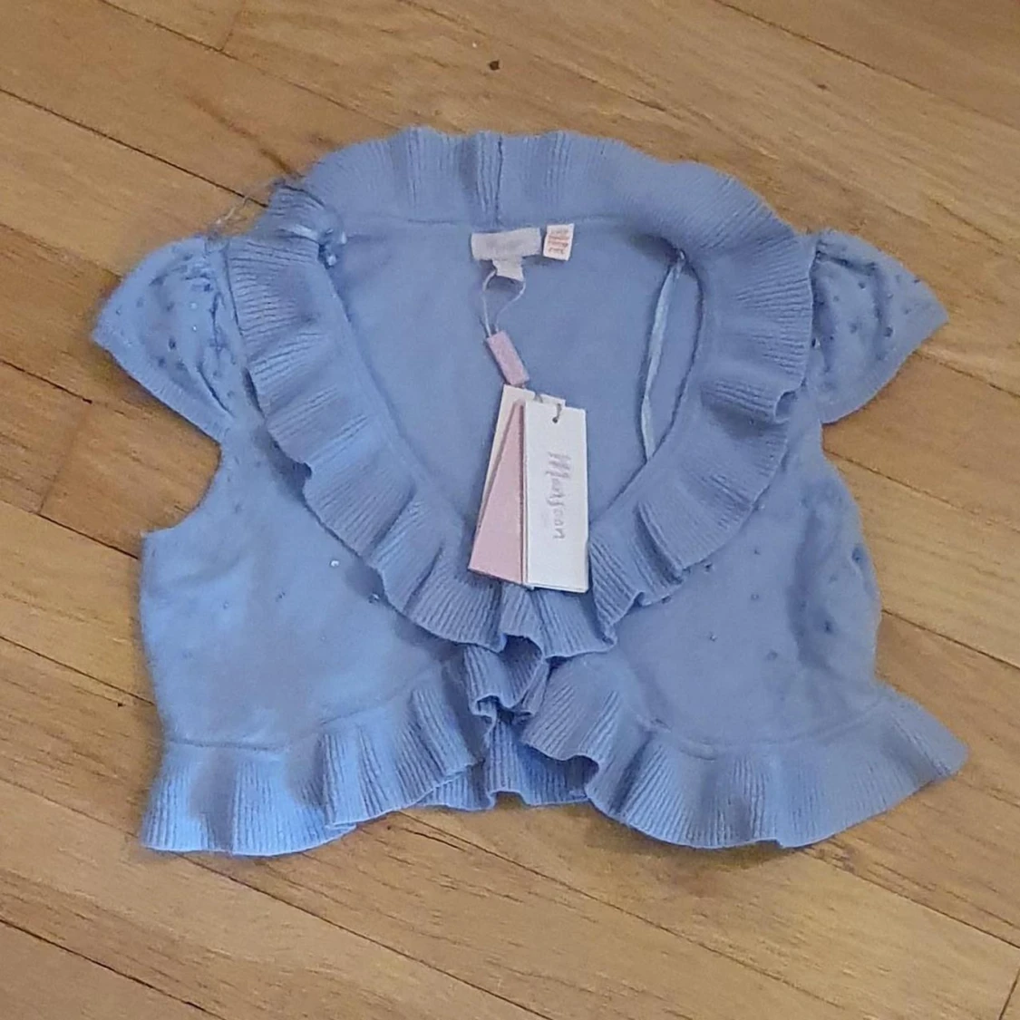 Kroppad blå cardigan