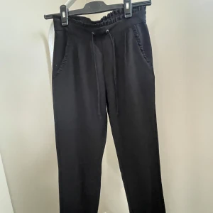 Baggy kostymbyxor - Svarta baggy kostymbyxor.