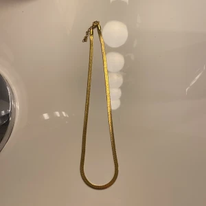 Halsband - Halsband från Märta rasch kollektion med ur och penn🤩 köpt för ca 400kr och använt Max 3 gånger