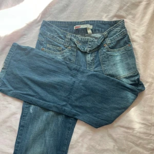 lågmidjade jeans - lågmidjade vida jeans från only