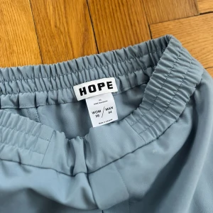 Hope byxor - Ljusblå hope byxor, aldrig använda!unisex wom-36 man-44