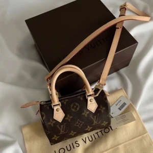 Louis Vuitton Monogram Nano Speedy Authentic - Louis Vuitton Monogram Nano Speedy Authentic gently used like new