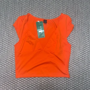Topp - Orange topp från Shein. Aldrig använd med lappen kvar! 