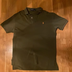 Ralp Lauren pike - Storlek medium, mörkgrön pike. Bra pris för skicket.