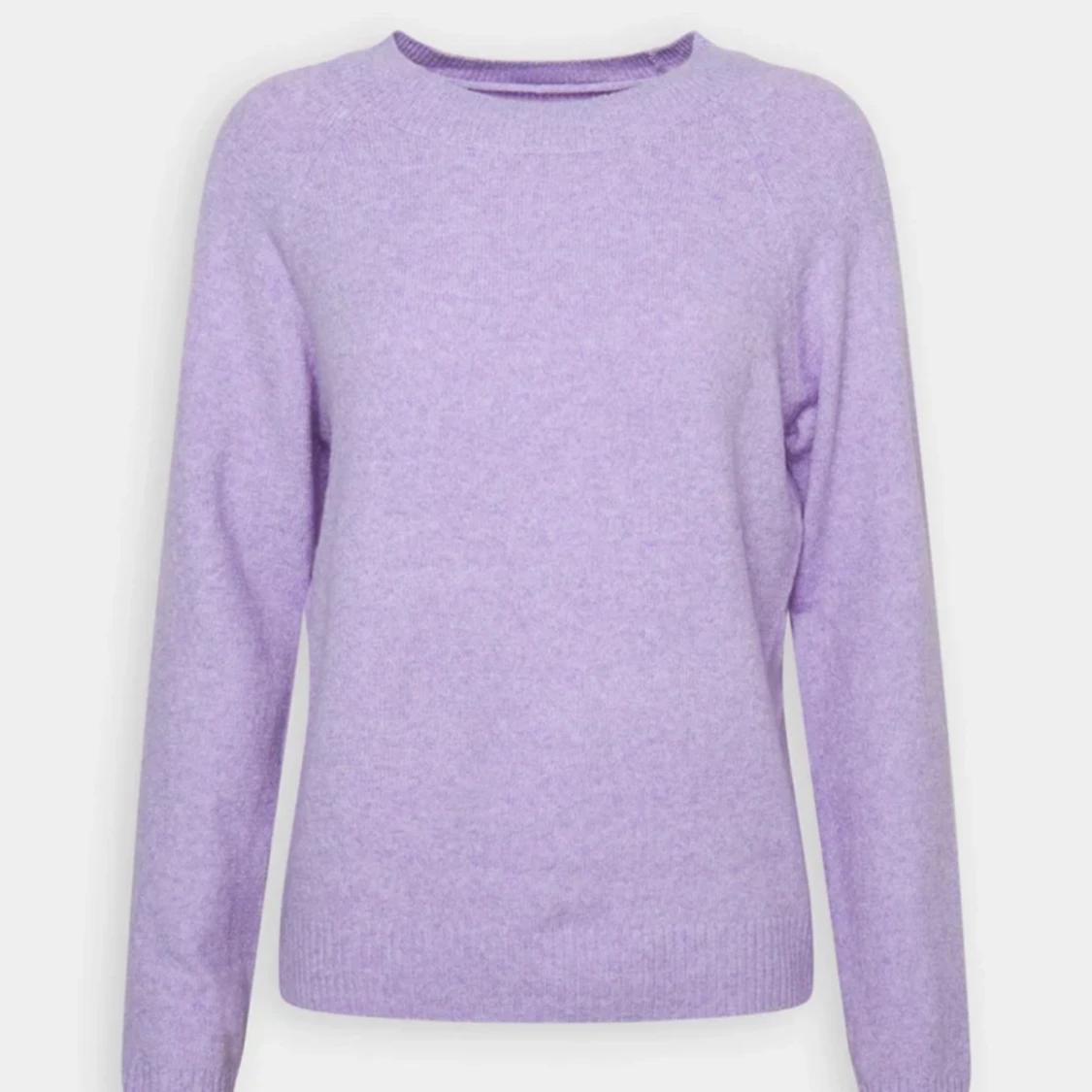Lila stickad tröja