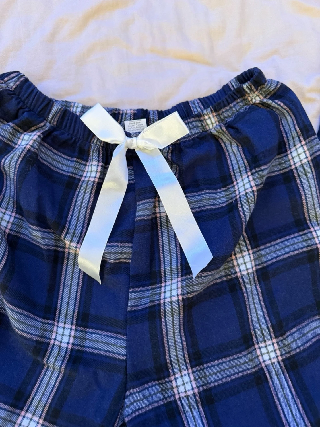 Blå-rutiga pyjamasbyxor med rosett - 1