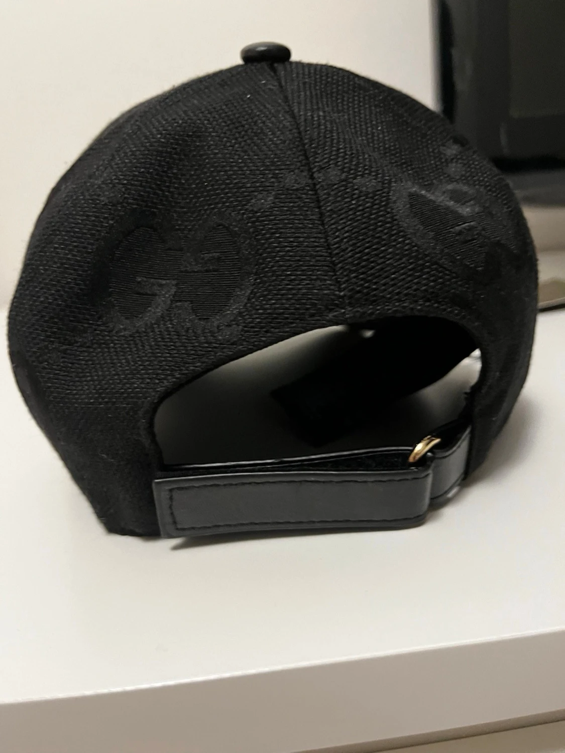 Svart keps från Gucci med GG-mönster - 1