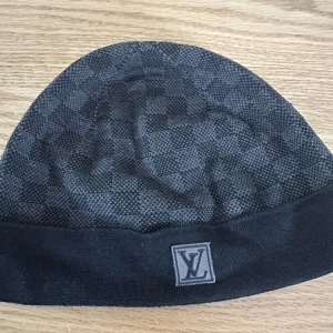 Mössa - Svart mössa äkta 