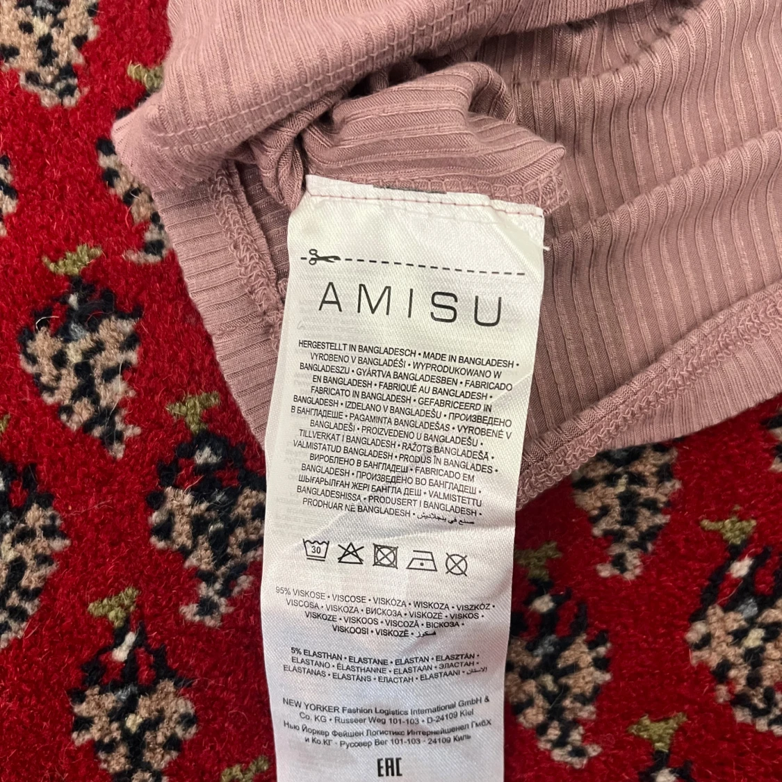 Rosa ribbad polotröja från Amisu XL - 2