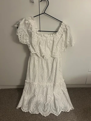 White Broderie Anglaise Dress  - Beautiful white broderie anglaise (eyelet) dress with romantic off shoulder and a flattering square neckline. Features a fitted waist and a flowy tiered skirt with scalloped hem details.  Lightweight and breathable – perfect for summer, holidays, picnics, brunch, or special occasions. A timeless feminine piece with cottagecore and romantic vibes.