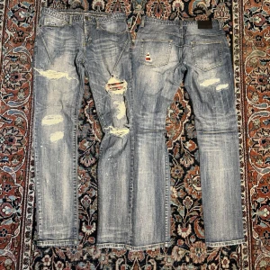Number (n)ine jeans - Helt sjuka number (n)ine jeans köpta rakt från Japan, dessa är riktigt rare och svåra att få tag på dem har helt sjuka detaljer. Mått:  Midja:41cm Längd:102cm Benöppning:16,5cm