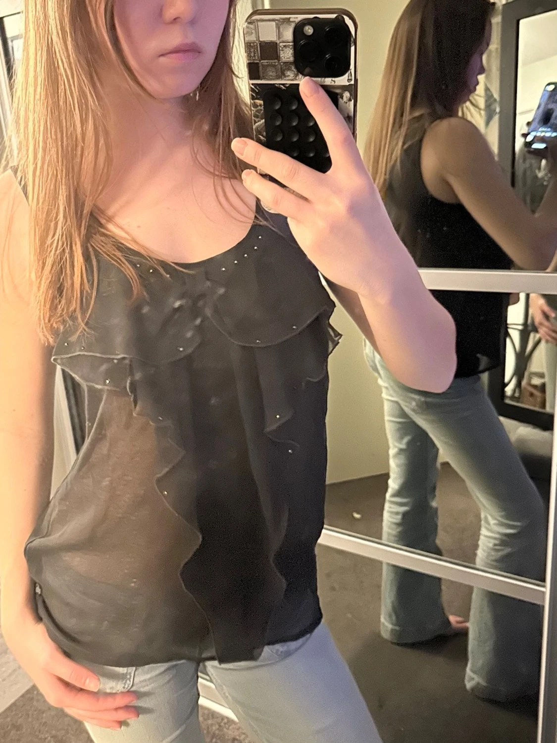 Svart volangig linnetopp