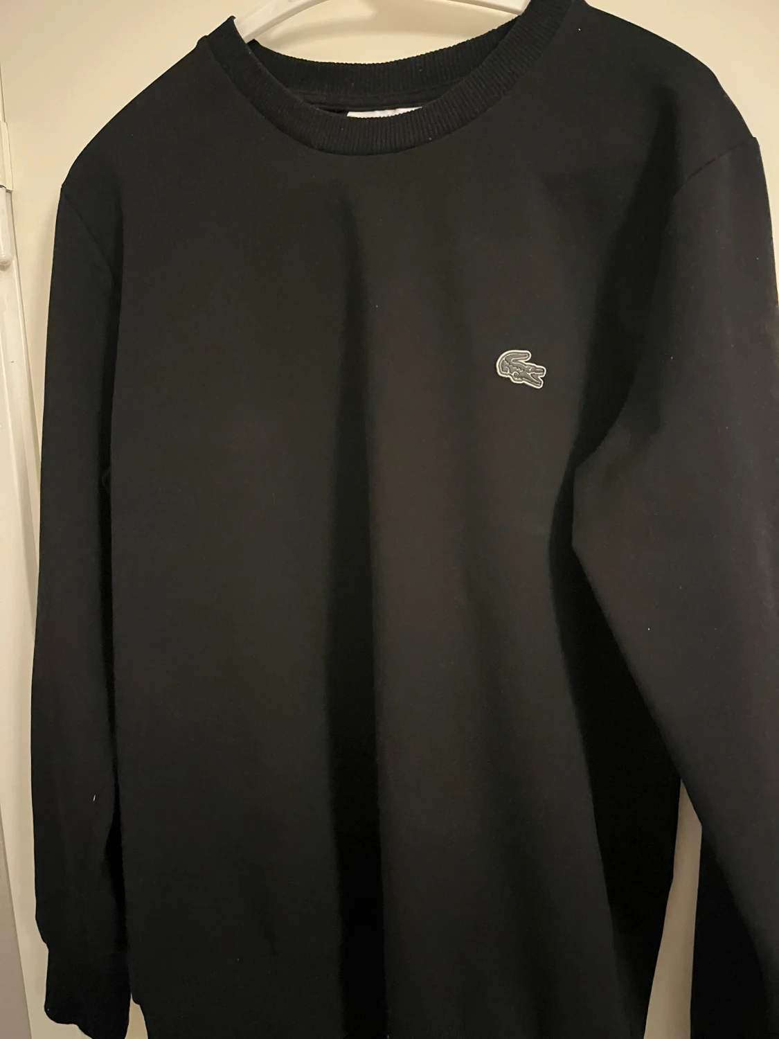 Svart Tracksuit från Lacoste 