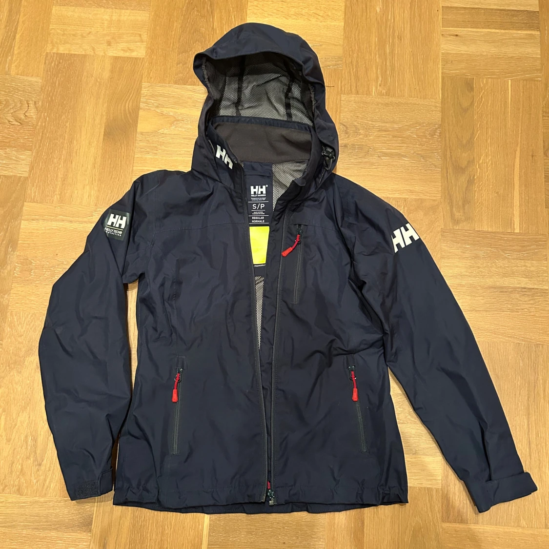 Mörkblå vind/regnjacka Helly Hansen S