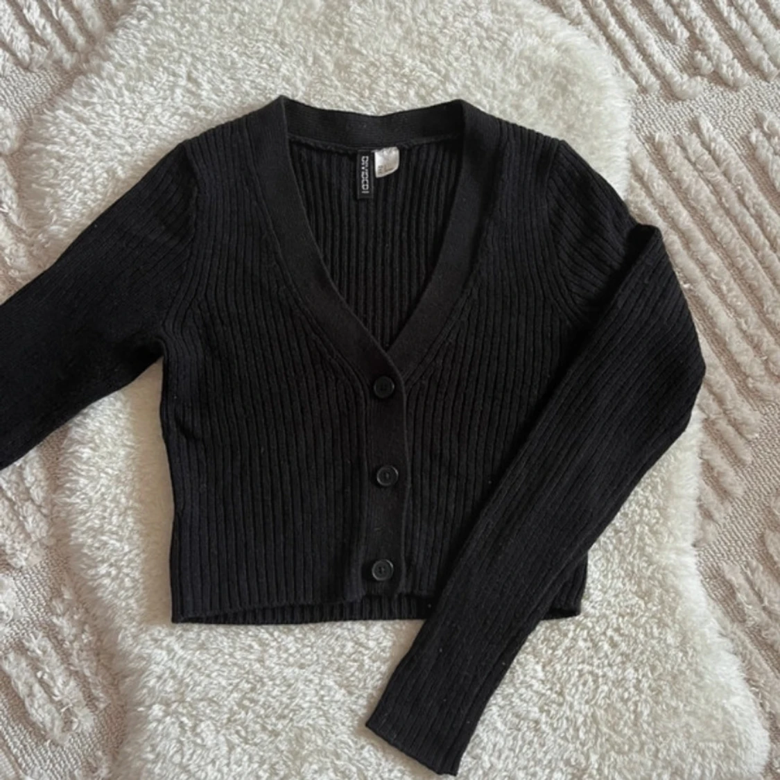 Svart ribbad kofta från H&M Divided