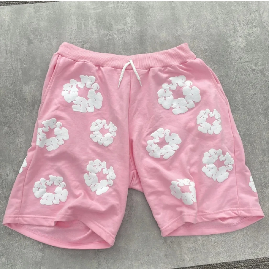 Rosa shorts från Denim Tears med blommor - 1