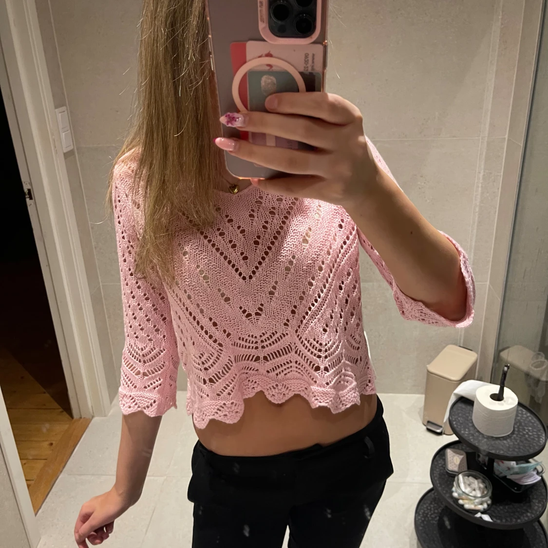 Ljusrosa stickad croppad topp