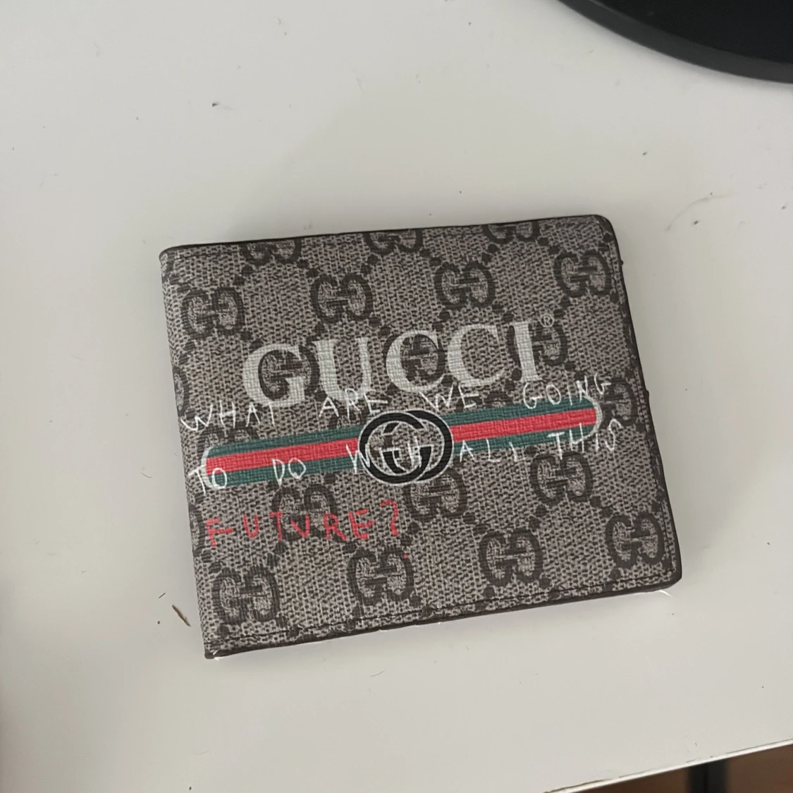 Gucci plånbok med GG-mönster