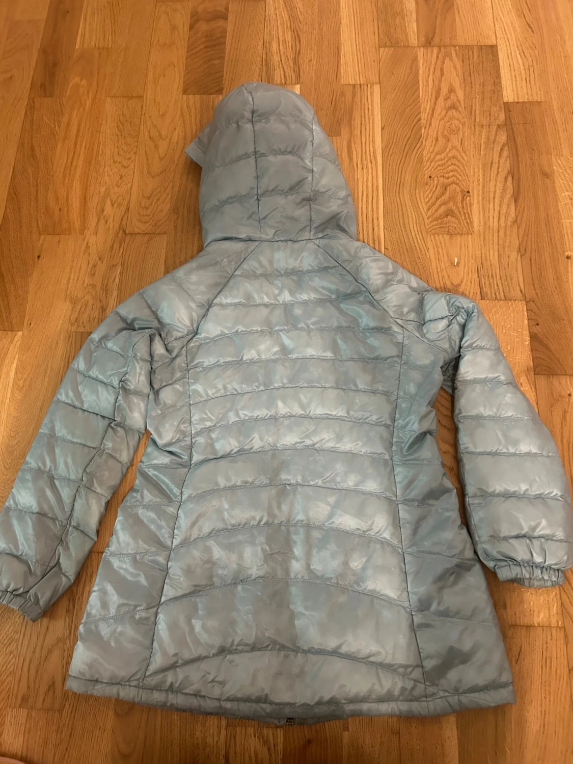 Ljusblå dunjacka med huva från Uniqlo - 1