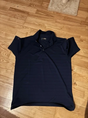 Callaway golftröja - Callaway golf tröja i storlek M, jätte fint skick knappt använd.