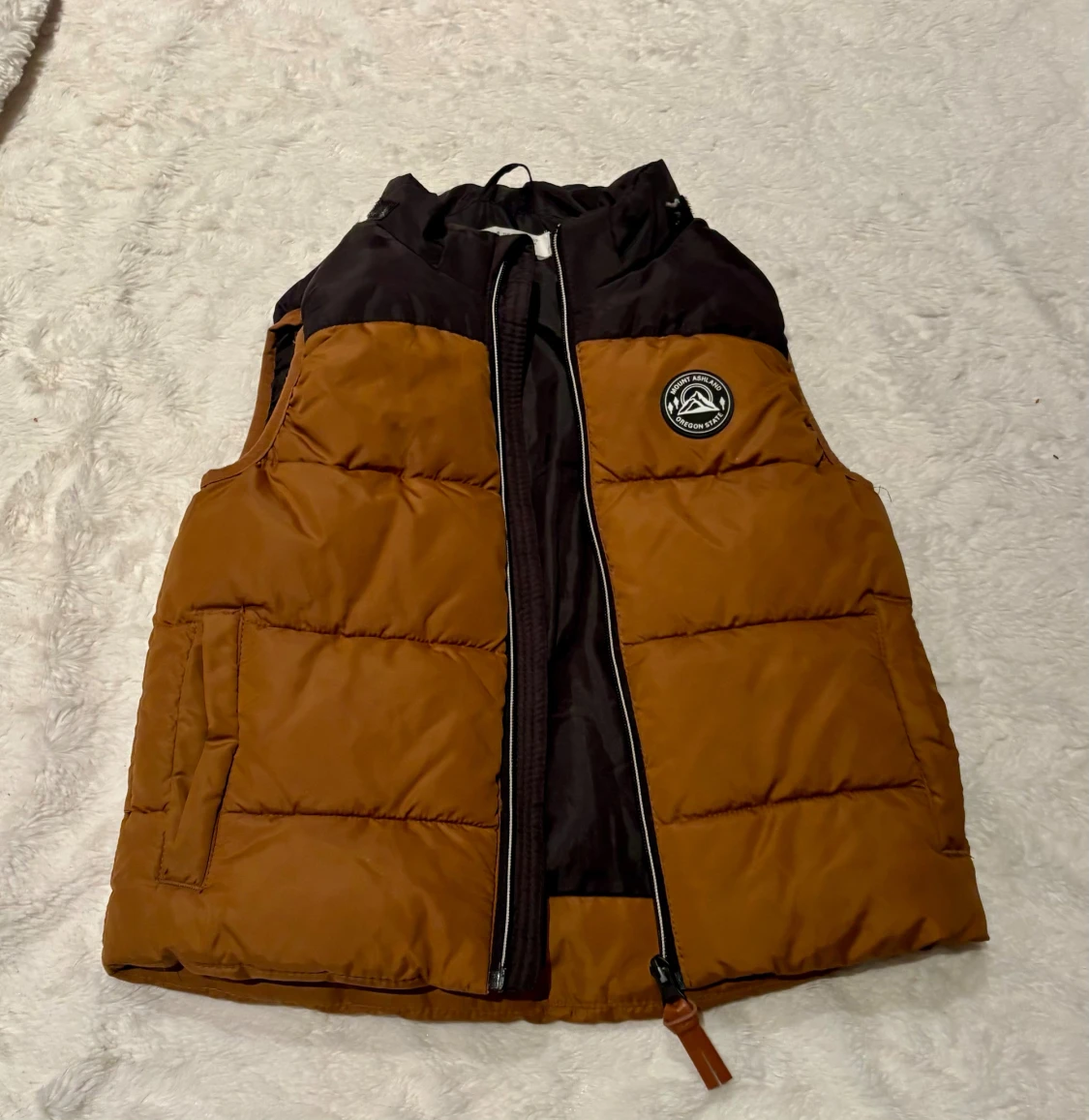 Brun och svart dunväst från H&M