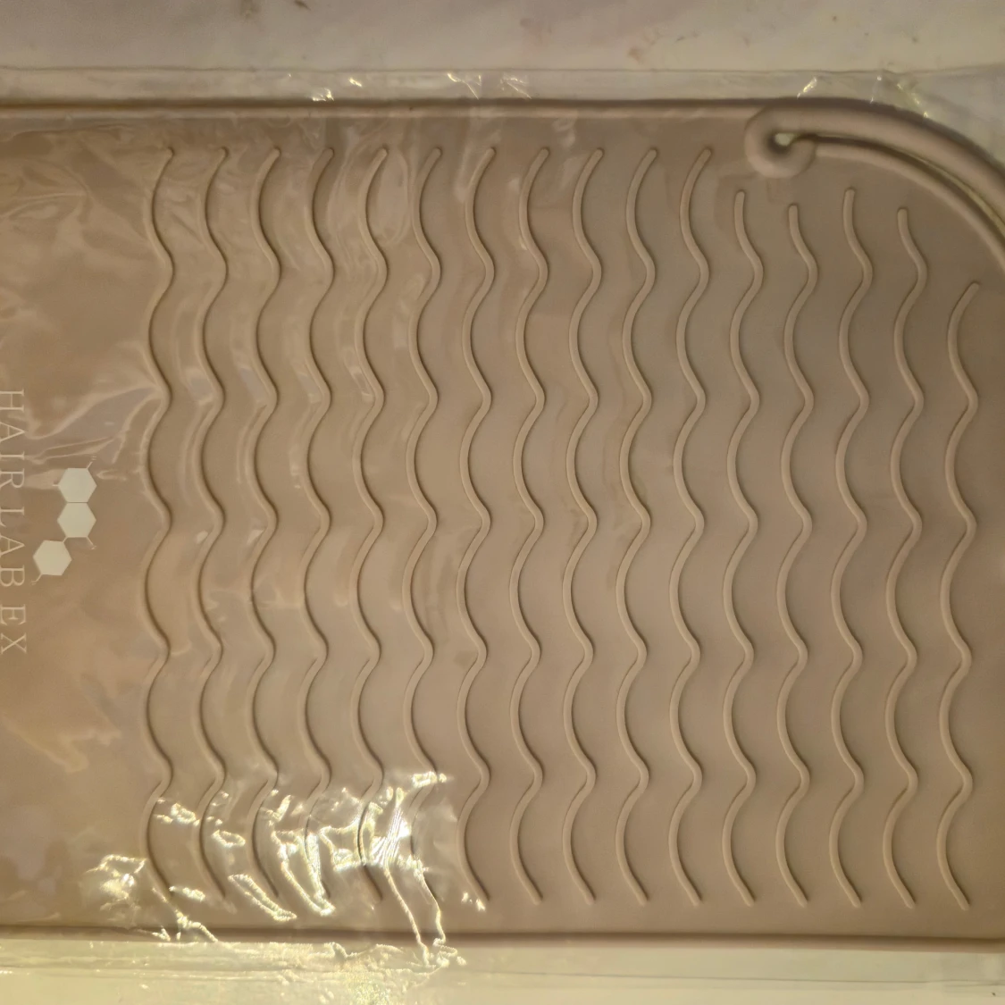 Beige rengöringsmatta från Hair Lab EX