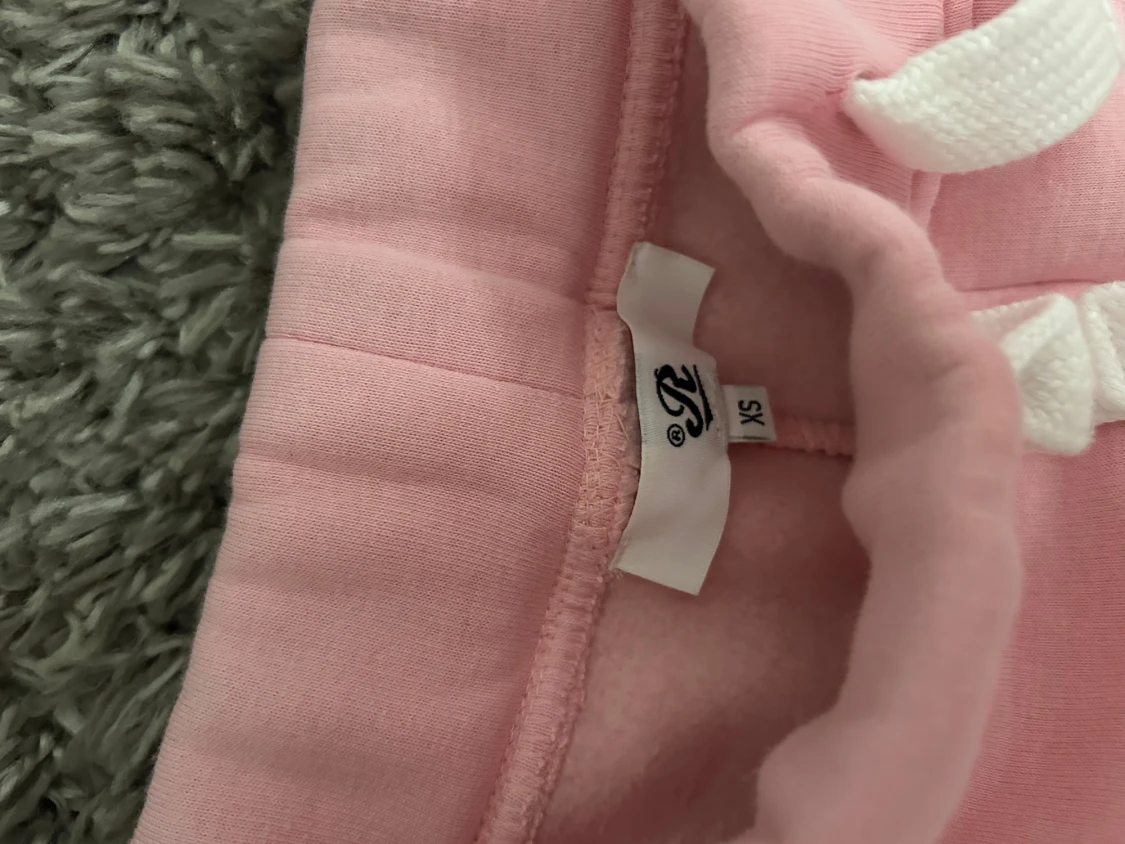 Rosa Russemerch Byxor - 2