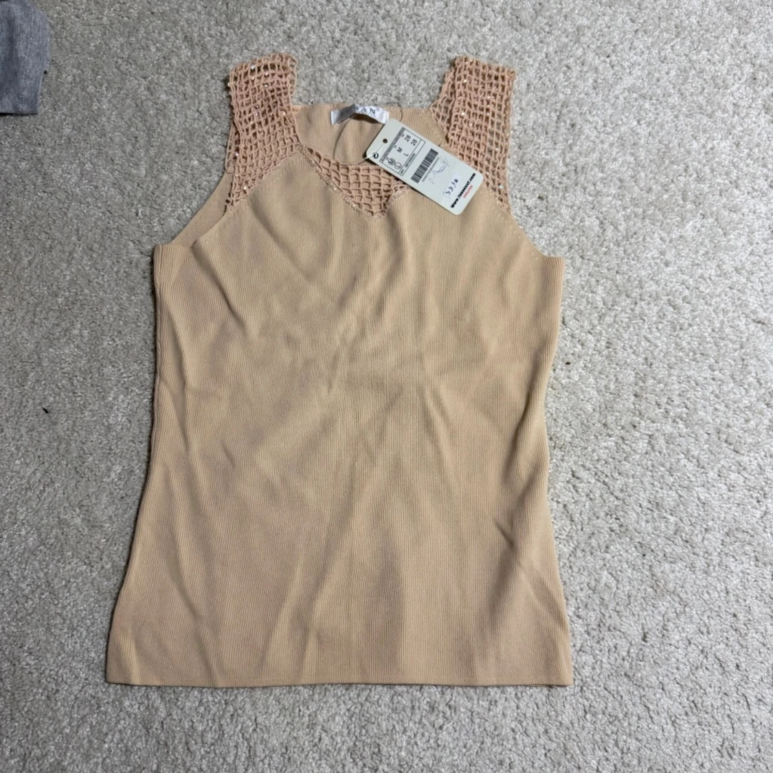 Beige linnetopp från Fusan