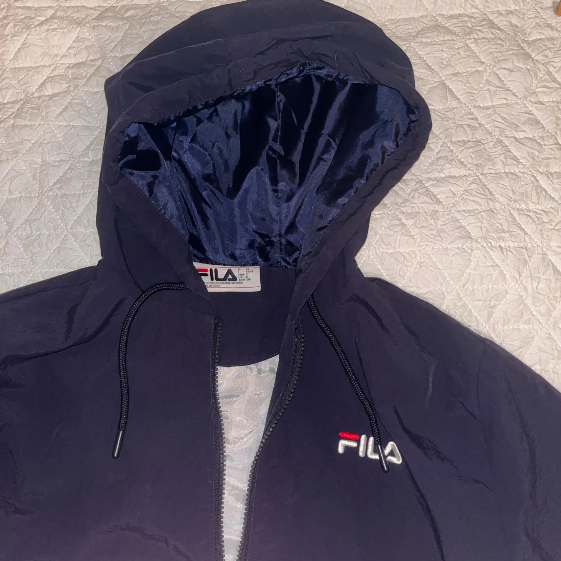 Blå och vit vindjacka från FILA - 1