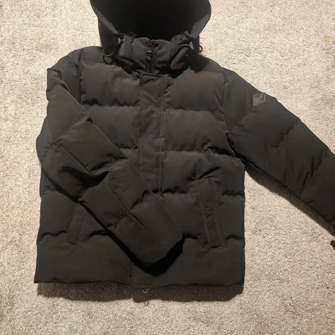 Svart pufferjacka från Replay