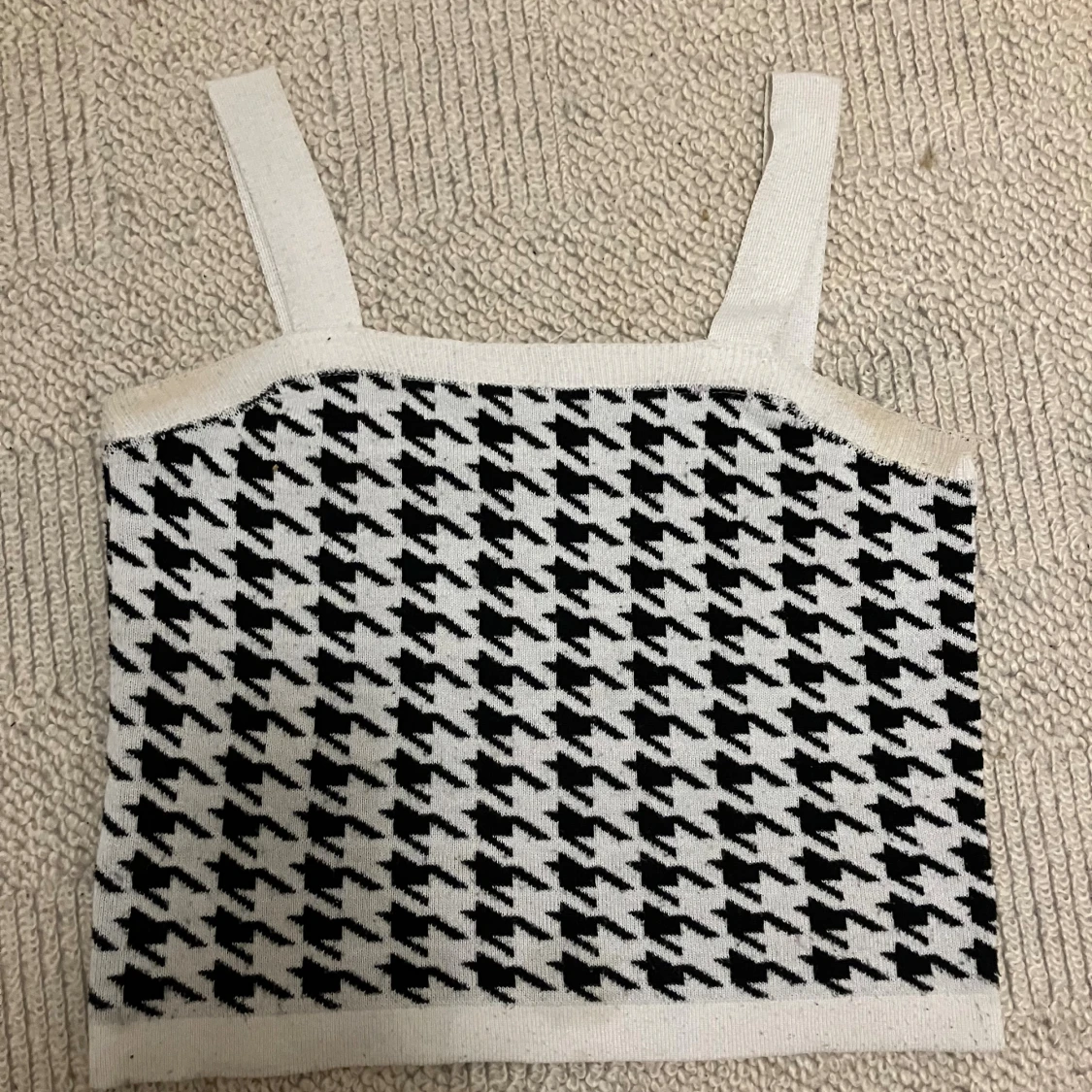 Svartvit rutig linnetopp