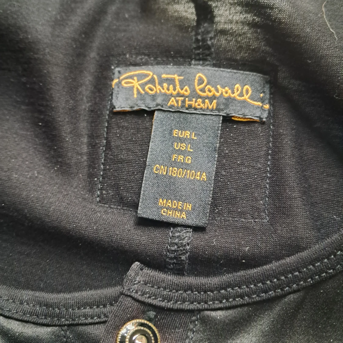 Svart skjortan från Roberto Cavalli at H&M, L i Siden o Bomull.  - 1