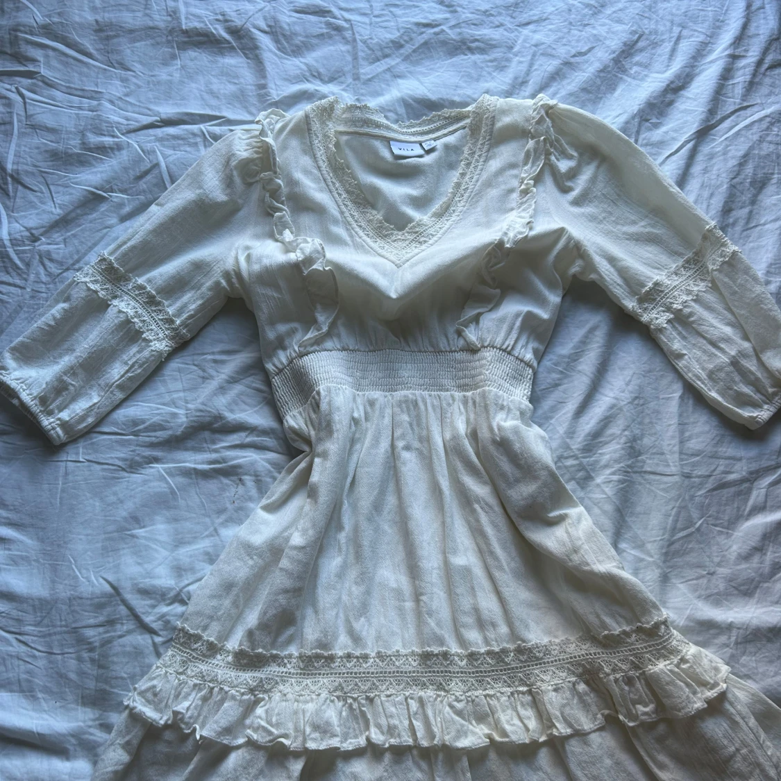 Vit spetsklänning från Vila