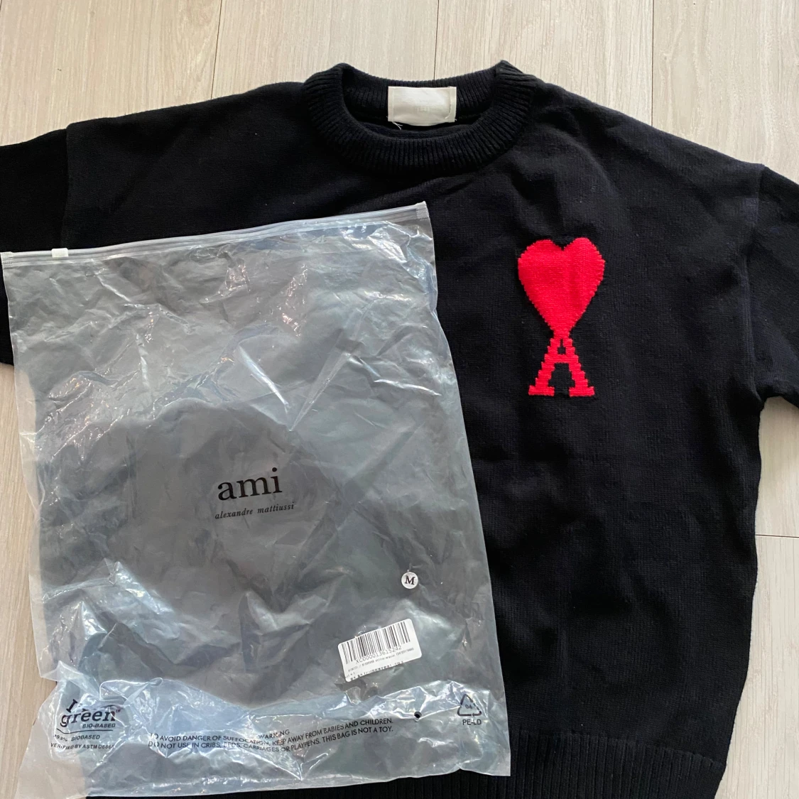 Svart stickad tröja från Ami Paris