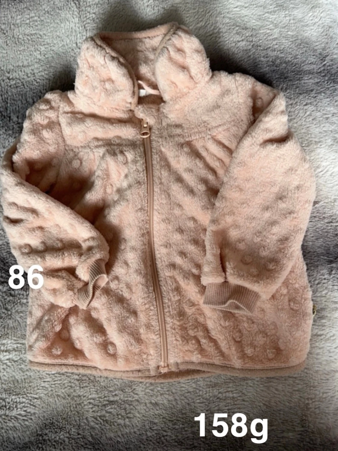 Ljusrosa fleecejacka med huva