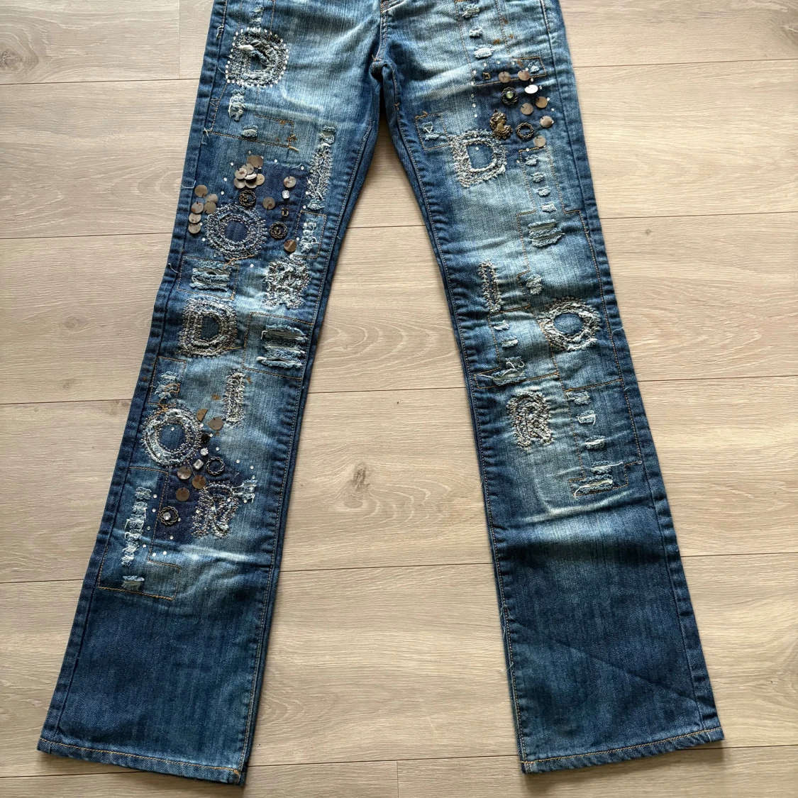 Blå bootcut jeans från Christian Dior