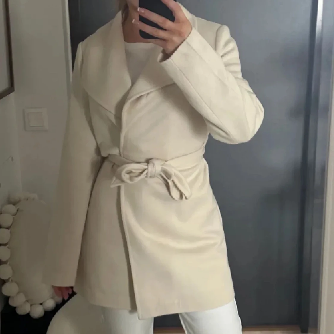 Beige kappa med knytband