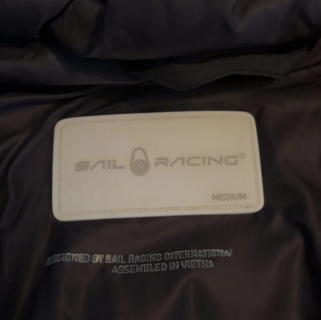 Svart pufferjacka från Sail Racing - 2