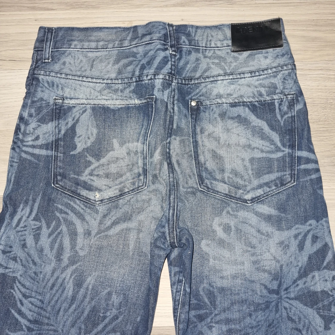 Blå denimshorts med bladmönster H&M - 4