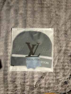 Mössa - Tag påse finns