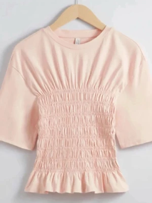 Rosa smockad topp - Rosa topp från & Other stories.