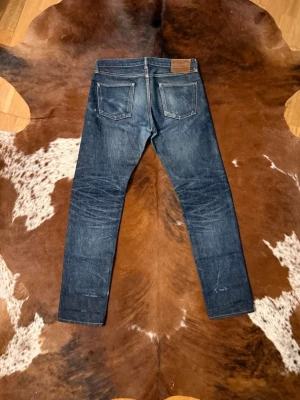 Selvage Momotaro Jeans - Tjena! Säljer dessa sjukt feta Momotaro jeans, byxorna är i storlek W33 men passar mindre, fint skick men finns lite små skavanker, hör av dig vid funderingar!🙌