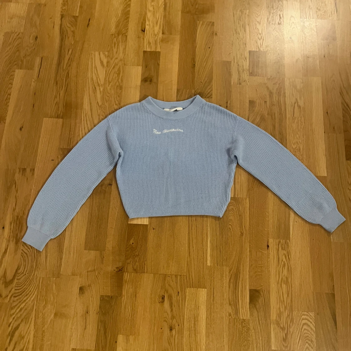 Ljusblå stickad tröja från H&M