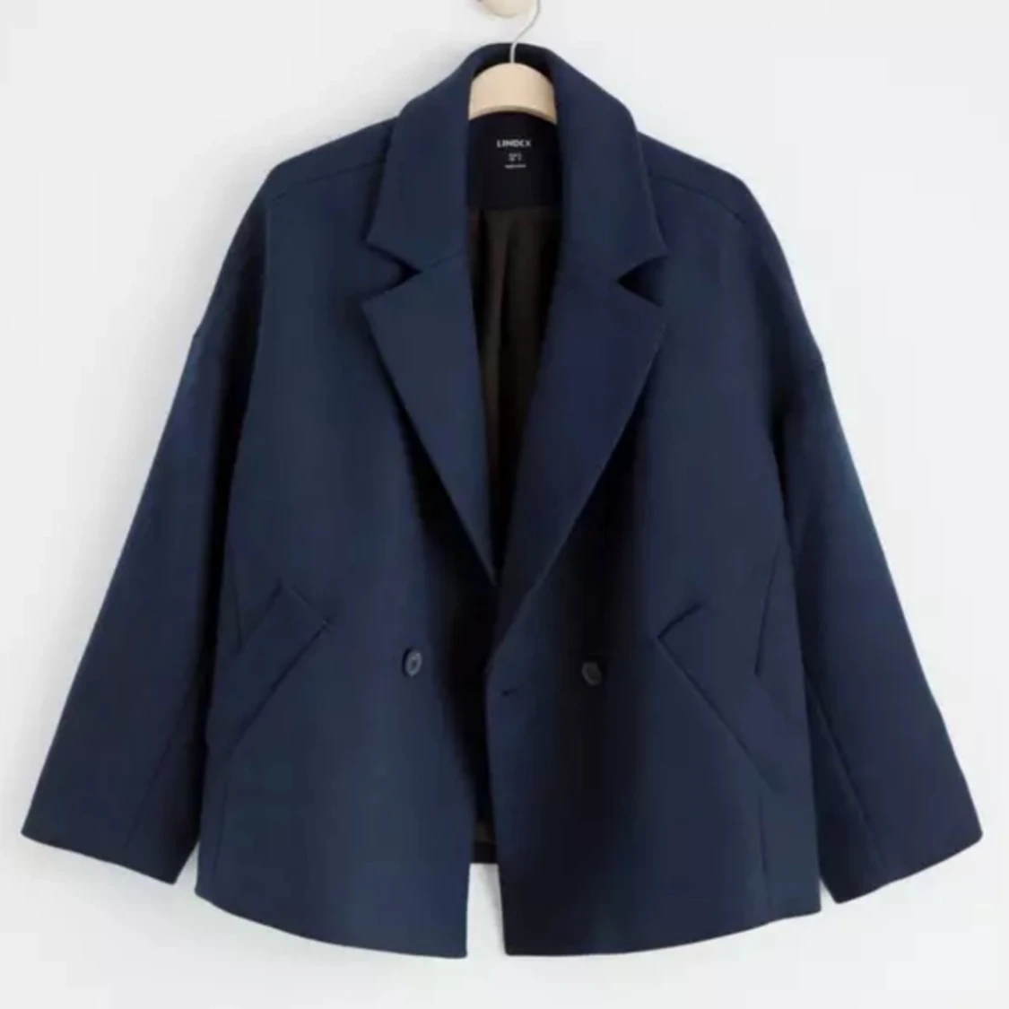 Mörkblå ullkappa från Lindex