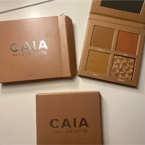CAIA Face Palette Classy - Oöppnad CAIA face palette i färgen Classy. Paletten innehåller contour, blush, bronzer och highlighter i varma, gyllene och bronsiga toner. Säljer då jag fick två likadana i julklapp💗