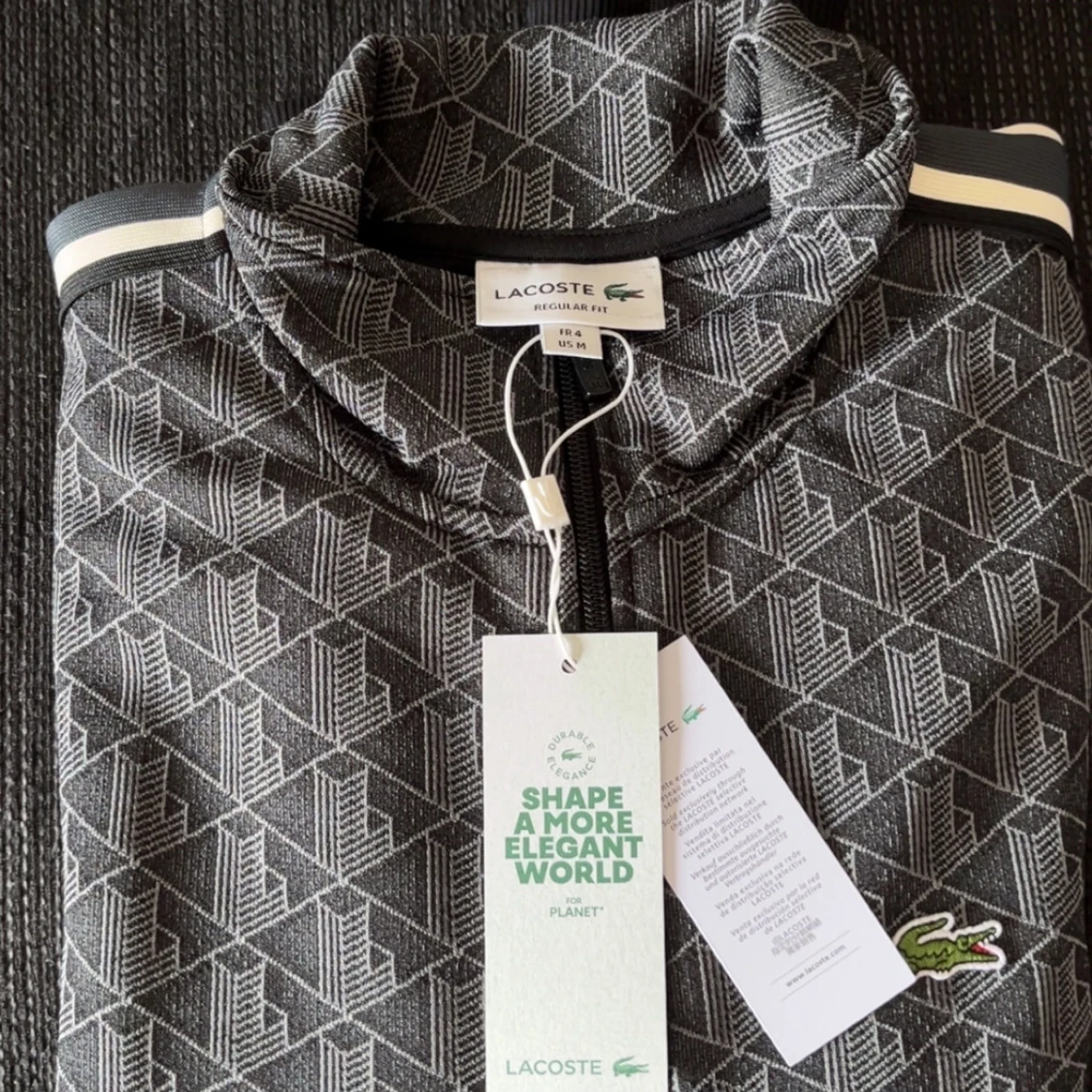 Grå mönstrad ziptröja från Lacoste - 1