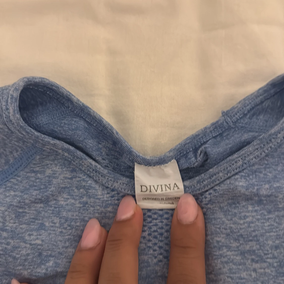 Blå långärmad träningströja från Divina - 3