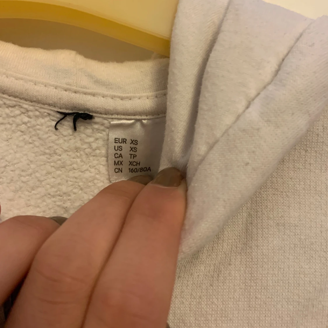 Vit hoodie med dragkedja XS - 1