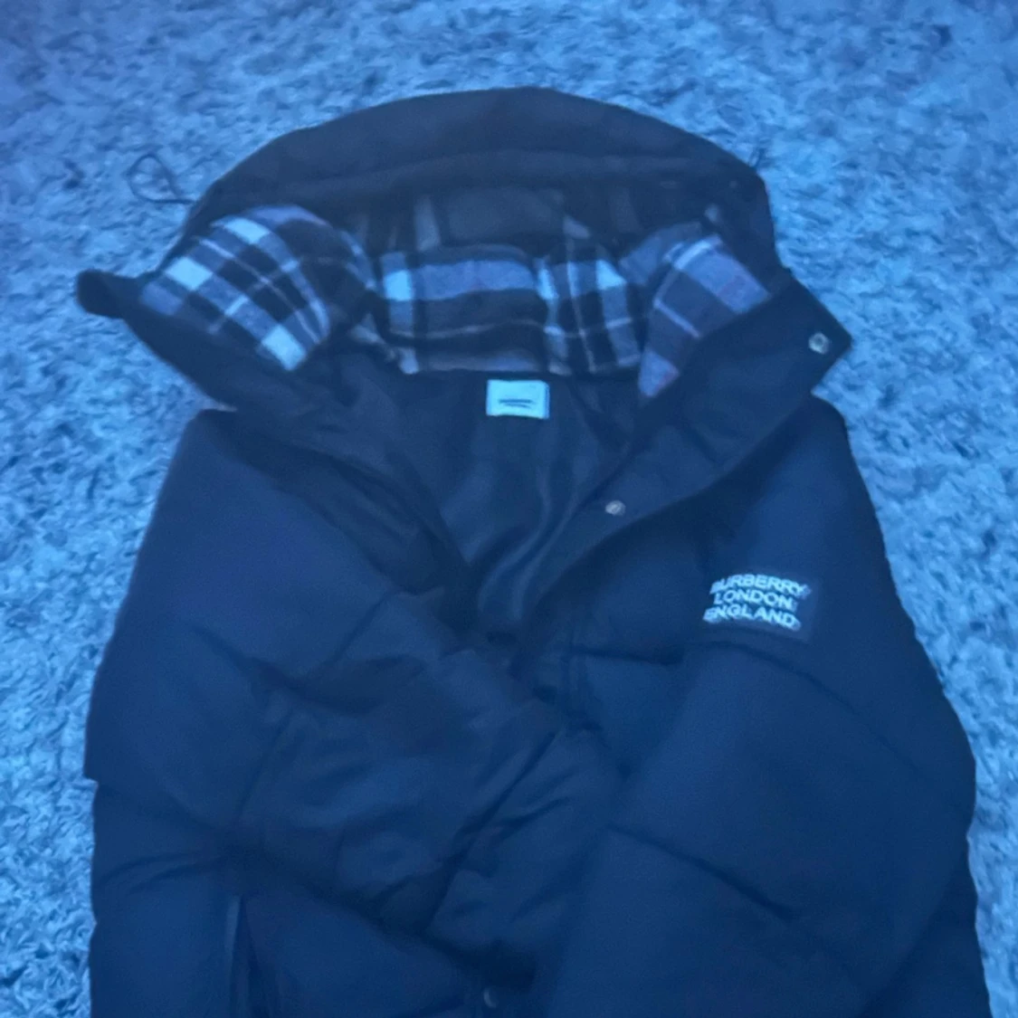 Svart dunjacka från Burberry - 90