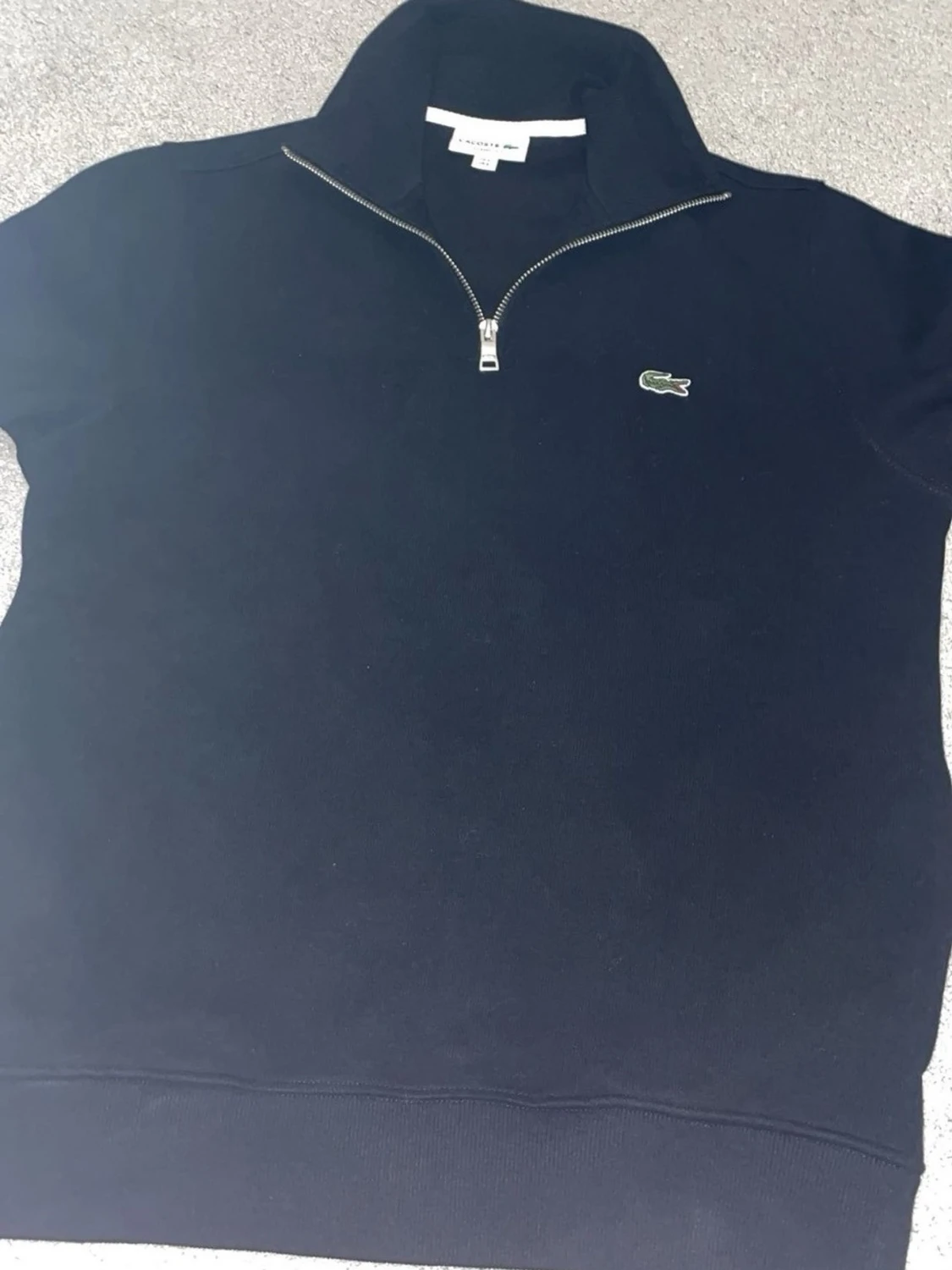 Svart halvzip tröja från Lacoste